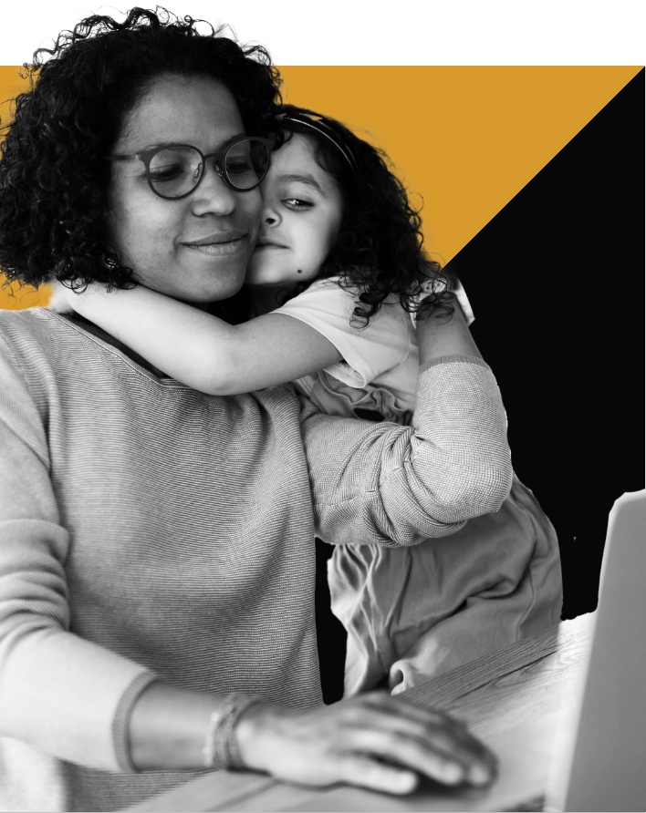 Mother and daughter using laptop